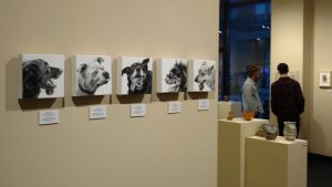 5 Petrulis dog tongue portraits on display in small art 2018 show in the Arts Illiana Gallery in Terre Haute, IN.